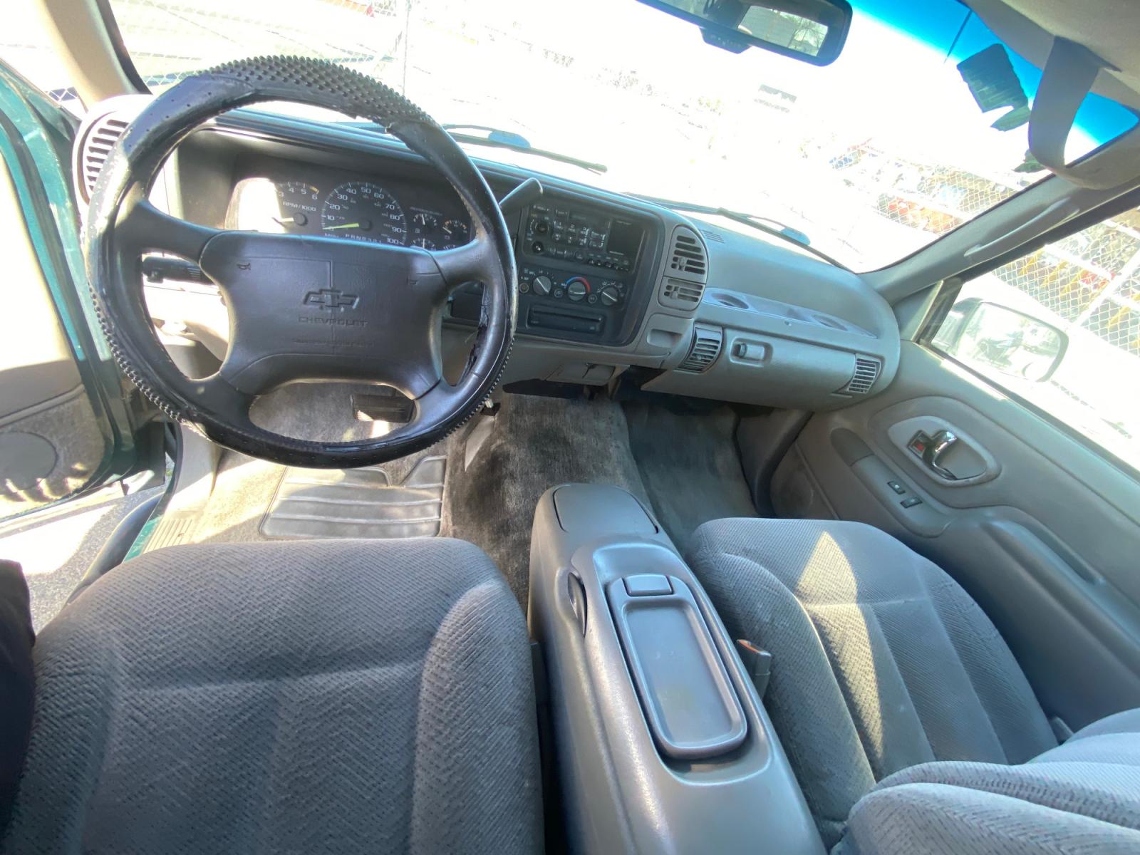 1996 Chevrolet Suburban C1500 2WD (1GNEC16R4TJ) with an 5.7L V8 OHV 16V engine, 4-Speed Automatic Overdrive transmission, located at 44356 Date Ave., Lancaster, CA, 93534, (661) 945-6555, 34.688919, -118.139374 - Photo #2